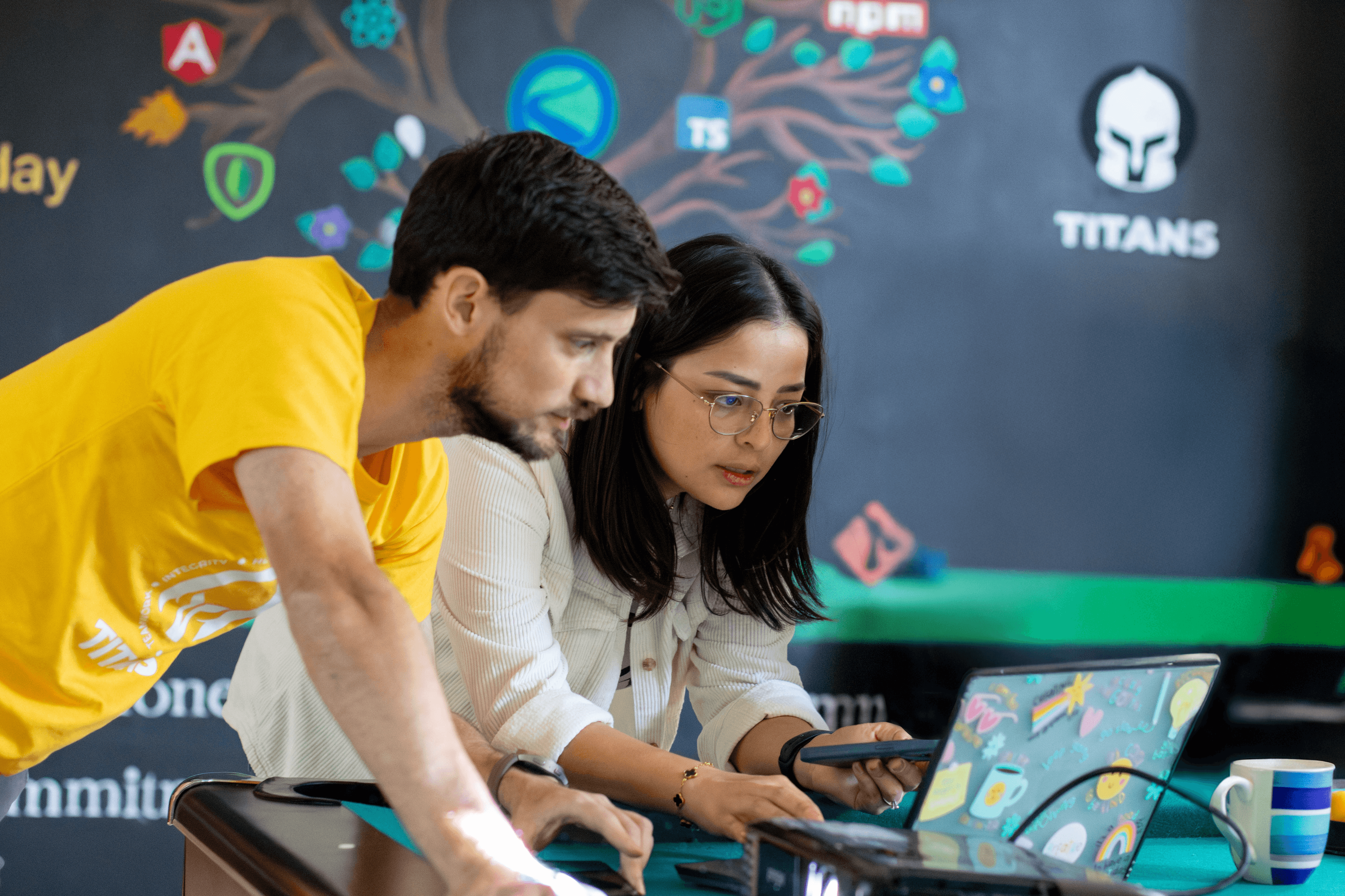 Engineers collaborating and learning together in a modern workspace