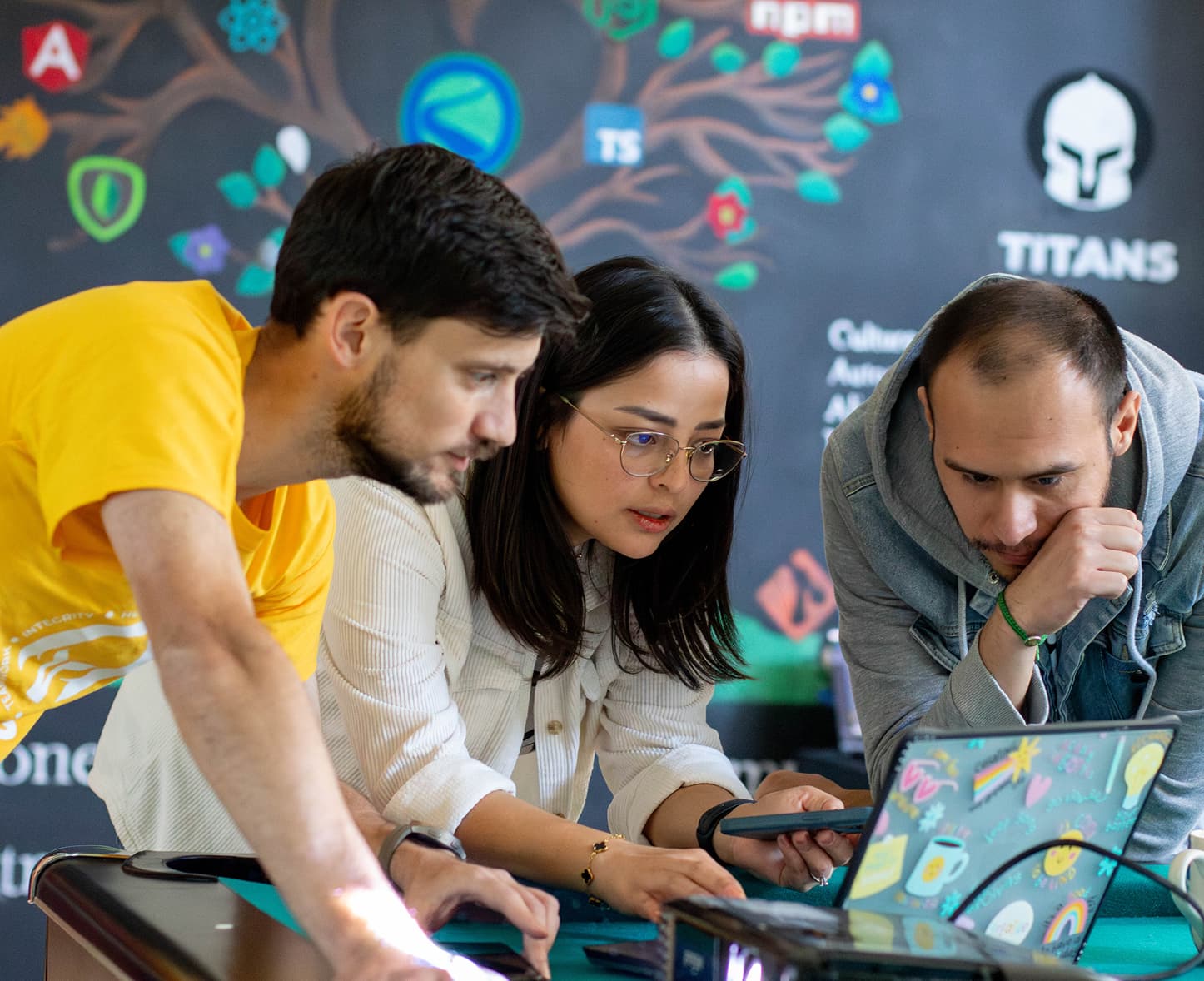 Engineers collaborating and learning together in a modern workspace