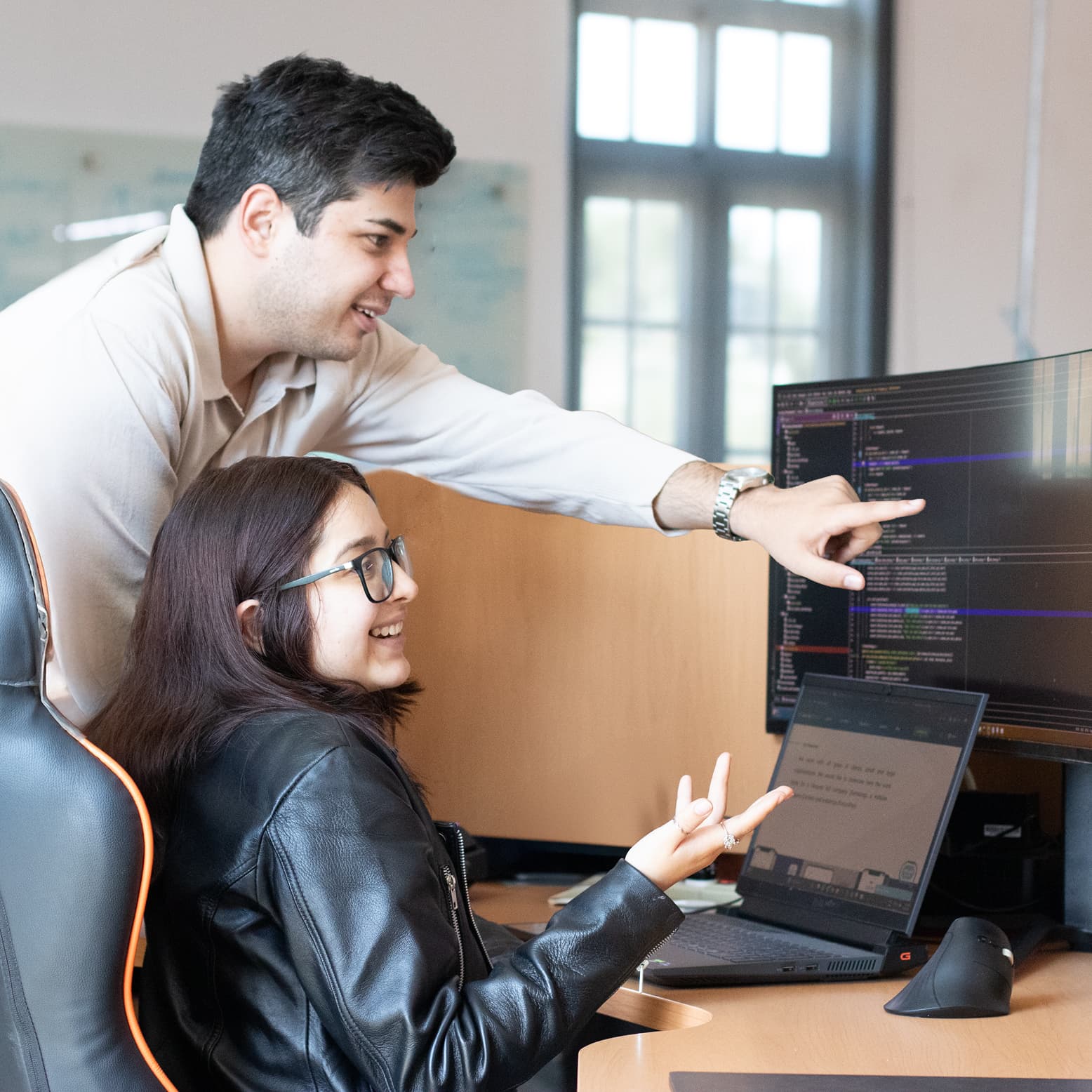 BTS Internship Program - Students learning and coding together in a modern tech environment